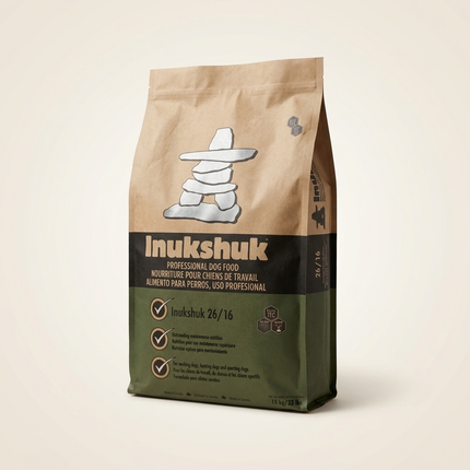 Inukshuk 26/16 All Life Stages Dog Food 15kg bag on warm beige studio background